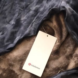 Lululemon mock neck sweat-wicking, four way stretch, shirt. BNWT. Size 10